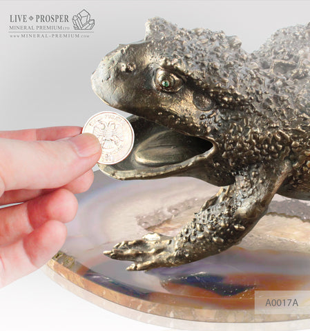 A bronze figure of a frog with demantoids inserts on a marvel and agate plats A0017A