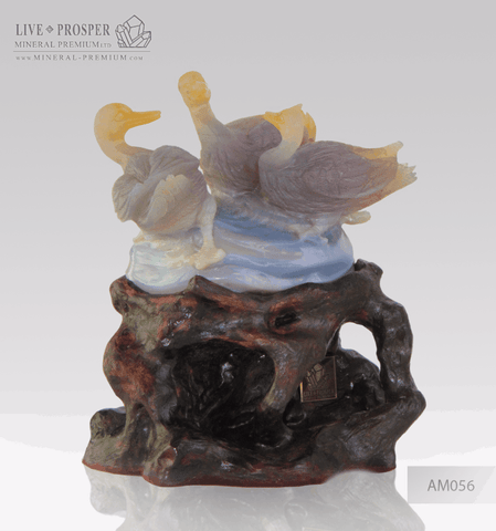 Solid Agate carving of Three Mandarin ducks on a Wooden stand