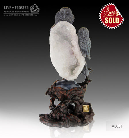 Agate carving of Two owls on branch with Amethyst Druze hollow on a Wooden stand