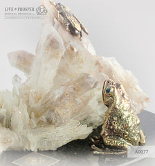 Bronze frog and Fly figures with Demantoid inserts with Quartz on a Dolerite plate
