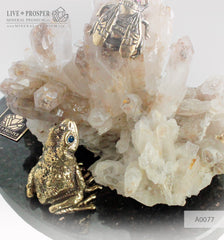 Bronze frog and Fly figures with Demantoid inserts with Quartz on a Dolerite plate