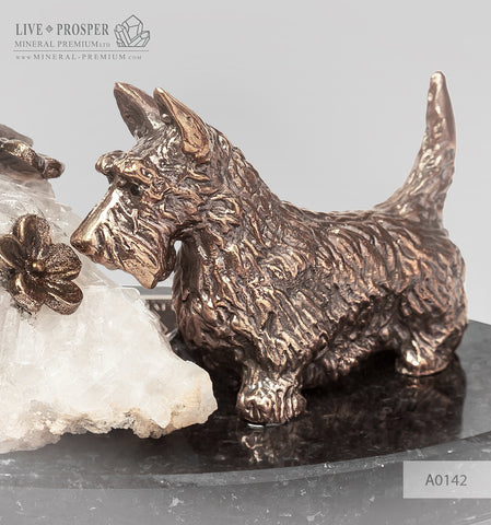 Bronze figure of a dog breed Terrier with calcite and pyrite on a dolerite plate
