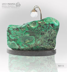 Bronze Cupid and Sweethearts with Malachite and Rock- crystal Sphere on a Dolerite plate