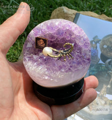 Bronze figure of scorpion at geode agate amethyst sphere with sea pearl and dermatoid inserts on dolerite plate Бронзовый скорпион в жеода аметиста агатовом шаре с морской жемчужиной и вставками из демантоидов на пластине из долерита