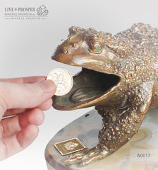 Bronze figure of frog with demantoids inserts on a marvel plate