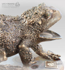 Bronze figure of frog with demantoids inserts on a marvel plate