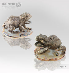 Bronze figure of frog with demantoids inserts on a marvel plate