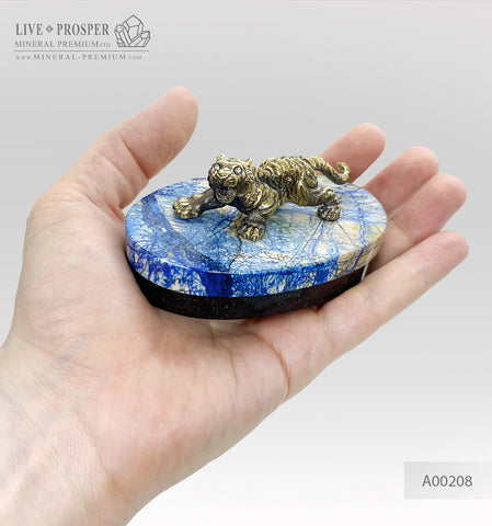 Handmade bronze tiger figure with Swarovski inserts and lapis lazuli plate on a dolerite base