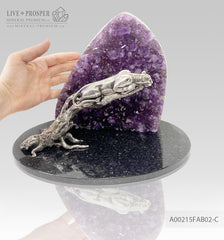 Bronze handmade jaguar figure silver-plated 0,999 with demantoids inserts on a savanna tree with amethyst
