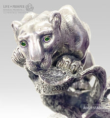 Bronze handmade jaguar figure silver-plated 0,999 with demantoids inserts on a savanna tree with amethyst
