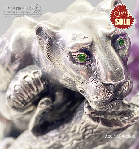 Bronze handmade jaguar figure silver-plated 0,999 with demantoids inserts on a savanna tree with amethyst