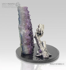 Bronze handmade jaguar figure silver-plated 0,999 with demantoids inserts on a savanna tree with amethyst