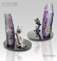 Bronze handmade jaguar figure silver-plated 0,999 with demantoids inserts on a savanna tree with amethyst