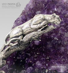 Bronze handmade jaguar figure silver-plated 0,999 with demantoids inserts on a savanna tree with amethyst