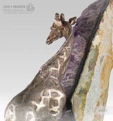 amethyst with bronze giraffe figure with amethyst on dolerite plate 