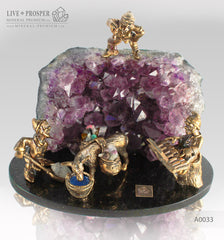 Bronze dwarf miners with a donkey figures at amethyst mine on dolerite plate 