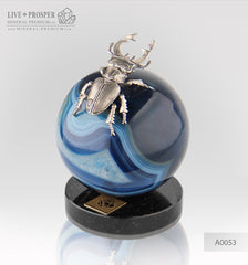  Silver figure of beetle deer on agate sphere and a dolerite plate  Серебренный жук олень на сфере из агата на пластине из долерита 