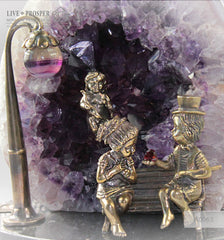 Bronze Figure of Sweethearts on a Bench  with Garnet heart