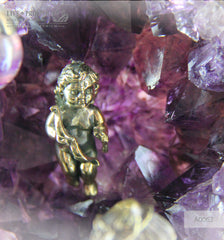 Bronze Figure of Sweethearts on a Bench  with Garnet heart