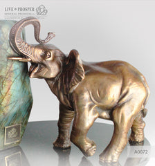 Bronze Elephant figure with Labradorite on a Dolerite plate