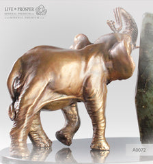 Bronze Elephant figure with Labradorite on a Dolerite plate