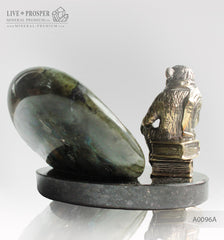 Bronze figure of monkey philosophy with labradorite on dolerite plate