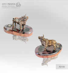 Bronze bull with bush on agate and marvel plate