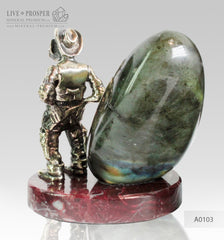 Bronze figure of Monkey sheriff with Labradorite on Dolerite plate