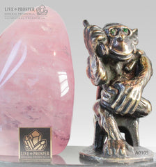 Bronze figure of Monkey with Demantoid inserts with Pink quartz on a Dolerite plate