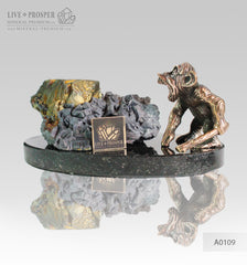 Bronze figure of monkey on guard with sphalerite pyrite on a dolerite plate A0109