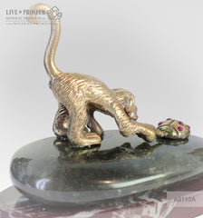 Bronze figures of Monkey and Ladybug with Demantoid inserts With labradorite on Marvel plate
