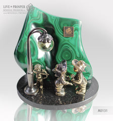 Bronze cupid and sweethearts with citrine sphere on a dolerite plate with malachite background Бронзовые купидон и влюбленные с шаром из горного хрусталя на фоне малахитового среза на пластине из долерита 