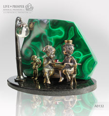 Bronze cupid and sweethearts with garnet heart and malachite background