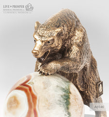 Bronze figure of bear with agate sphere on a dolerite plate  Бронзовый медведь с шаром из агата на пластине из долерита 