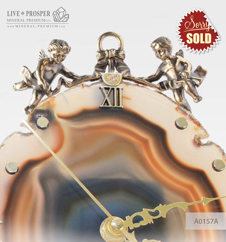 Clock with a bronze cupid figures on agate plate A0157A