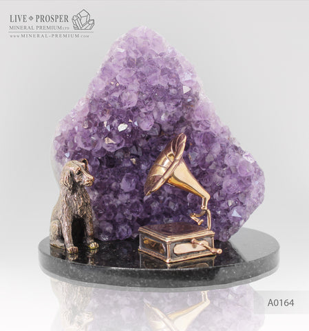 Bronze figures of the dog and Gramophone with agate geode amethyst on a dolerite plate