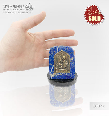 Bronze overlay of the icon figures of Peter and Fevronia with lapis lazuli on a dolerite plate