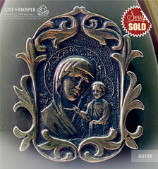 Bronze overlay of the icon figures of the Virgin Mary with jasper