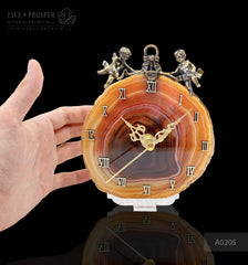 The wedding gift - Clock with a bronze cupid figures with garnet heart on agate plate Подарок на свадьбу - Часы с бронзовыми купидонами и сердцем из граната на пластине из агата  מתנה לחתונה - שעון עם מלאכי ברונזה על אגת Mineral Premium 