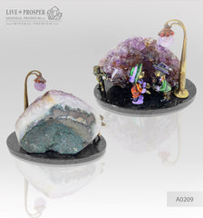Bronze composition of cupid and sweethearts with a rose flower and street light within geode agate amethyst druzy background and amethyst sphere of amethyst on a dolerite plate Бронзовая композиция с амуром, влюблёнными c розой и уличным фонарём на фоне агата жеода аметистовой друзы и сферой из аметиста на пластине из долерита