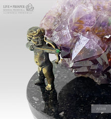Bronze composition of cupid and sweethearts with a rose flower and street light within geode agate amethyst druzy background and amethyst sphere of amethyst on a dolerite plate Бронзовая композиция с амуром, влюблёнными c розой и уличным фонарём на фоне агата жеода аметистовой друзы и сферой из аметиста на пластине из долерита