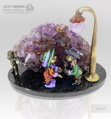 Bronze composition of cupid and sweethearts with a rose flower and street light within geode agate amethyst druzy background and amethyst sphere of amethyst on a dolerite plate Бронзовая композиция с амуром, влюблёнными c розой и уличным фонарём на фоне агата жеода аметистовой друзы и сферой из аметиста на пластине из долерита