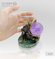 Bronze frog figure with demantoid inserts with an amethyst sphere on a marvel plate Бронзовая лягушка со вставками из демантоидов с шаром из аметиста на пластине из мрамора