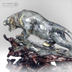 Solid labradorite Tiger carving on a wooden stand