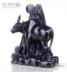 Solid obsidian carving of bull on guard - lunar calendar