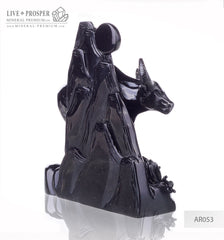 Solid obsidian carving of bull on guard - lunar calendar