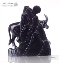 Solid obsidian carving of bull on guard - lunar calendar