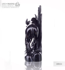 Solid obsidian carving of bull on guard - lunar calendar