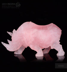 Solid Rose Quartz carvings of Rhinoceros on guard 