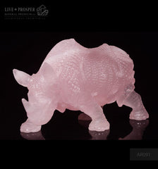Solid Rose Quartz carvings of Rhinoceros on guard 2